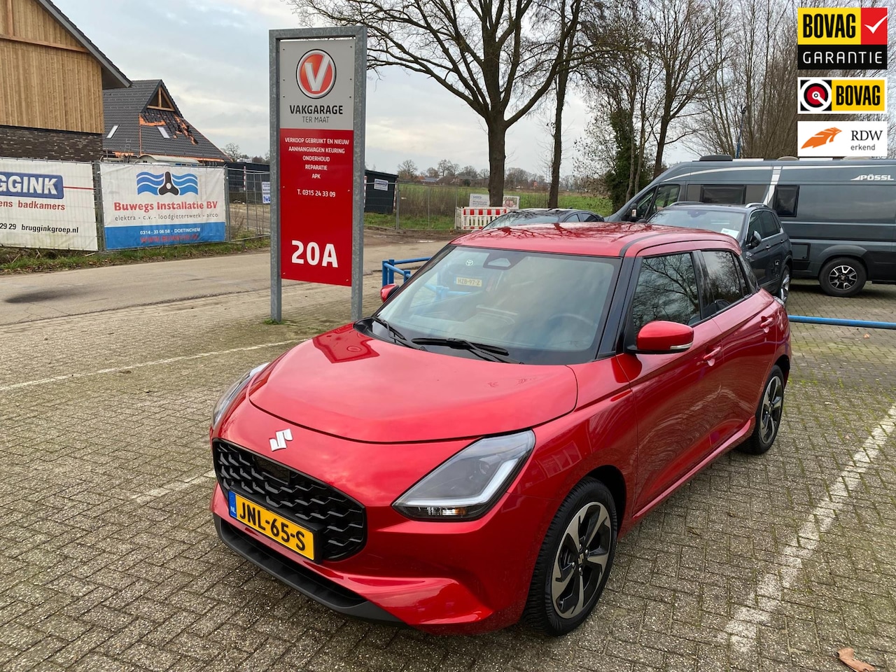Suzuki Swift - 1.2 Style Smart Hybrid | Keyless | Cruise Control | Stoelverwarming | All Season banden - AutoWereld.nl