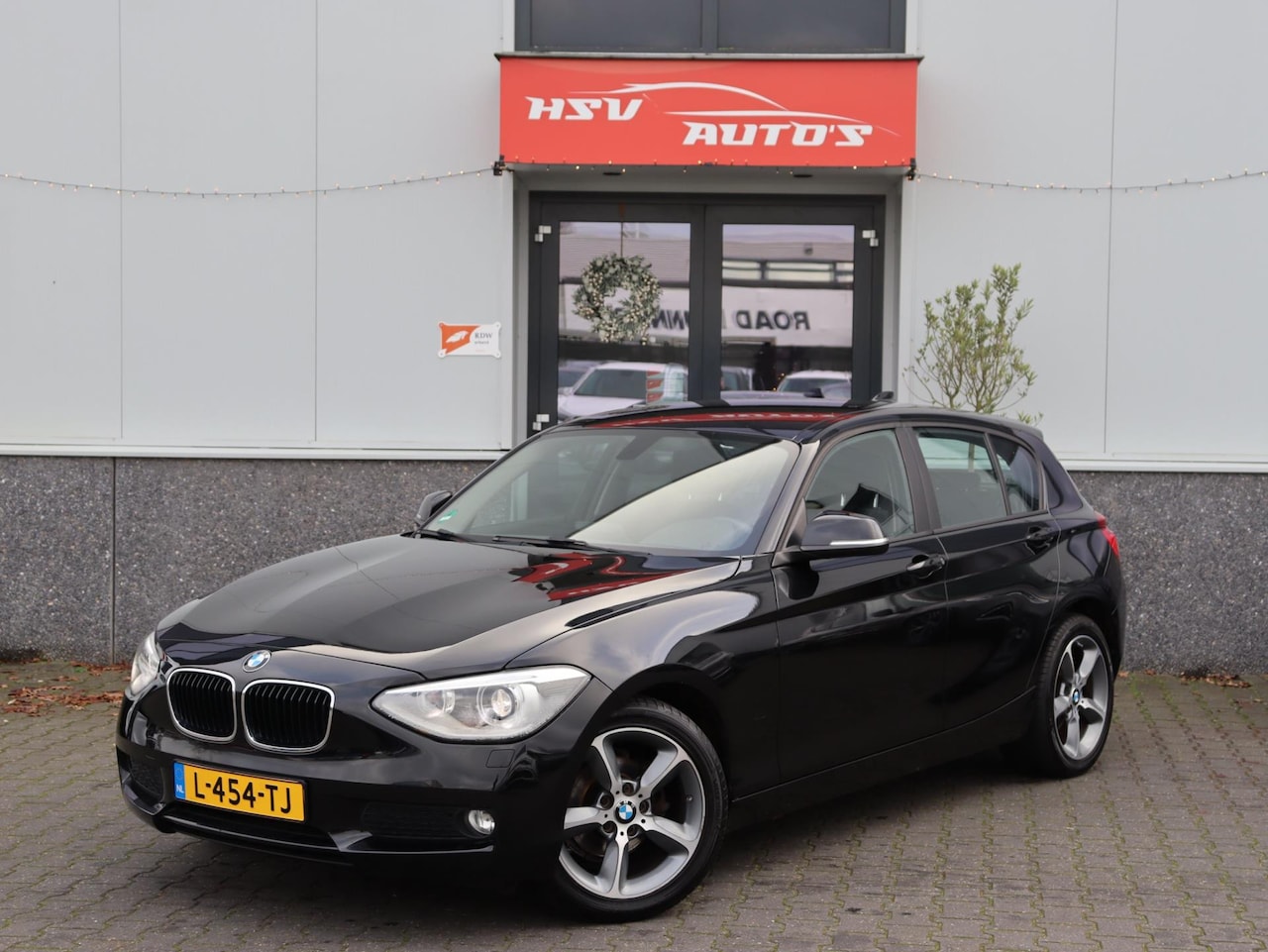 BMW 1-serie - 116i Business navi LM 4-deurs - AutoWereld.nl