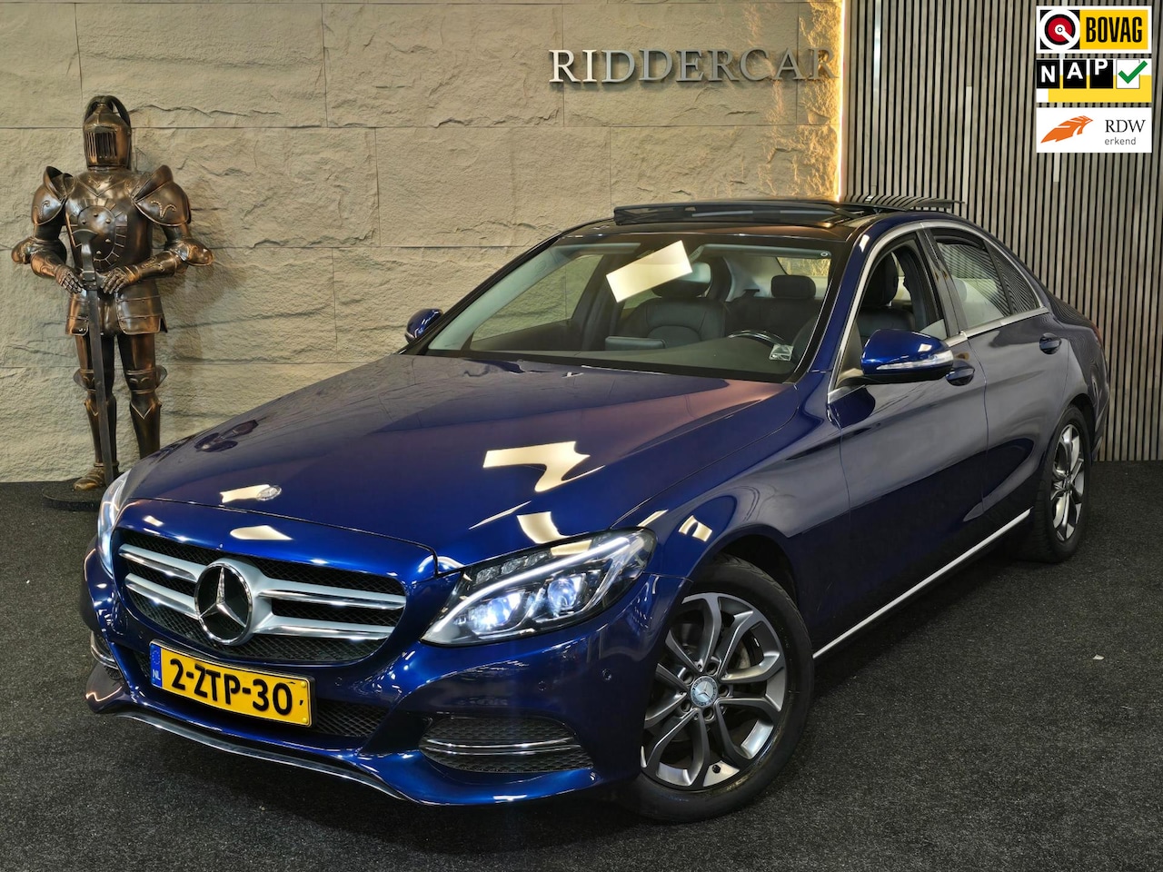 Mercedes-Benz C-klasse - 180 Ambition AMG|GARANTIE|PANO|1E EIG|NAP|AUTOMAAT|STOELVERW| - AutoWereld.nl