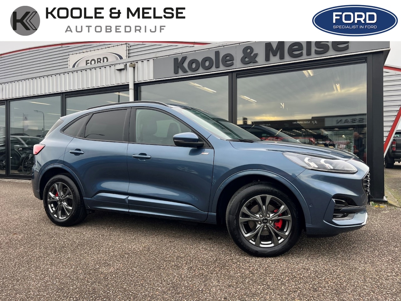 Ford Kuga - 2.5 PHEV e-CVT 225pk ST-Line X , Adaptive CC , voorruitverwarming , stoel en stuur verwarm - AutoWereld.nl