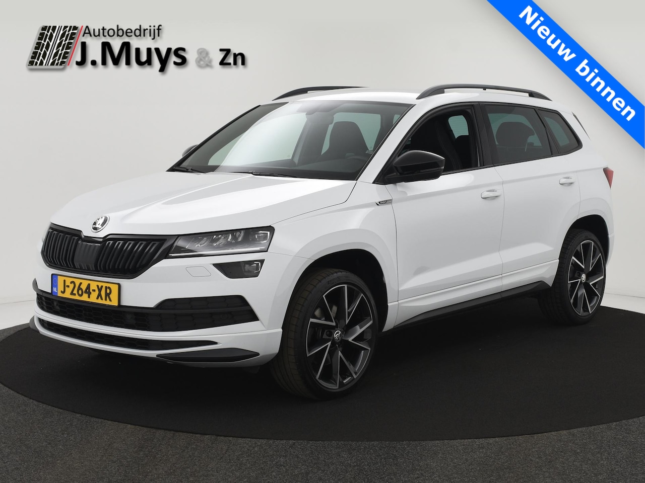Skoda Karoq - 1.5 TSI 150PK ACT Sportline Business AUTOM. TREKH|NAVI|WINTERPACK|CAMERA|LED|19INCH|CRUISE - AutoWereld.nl