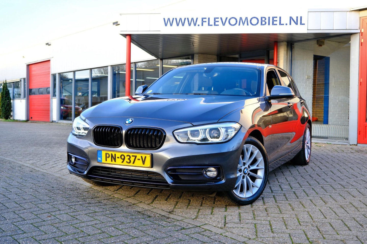 BMW 1-serie - 116d Executive 5-drs Aut. Navi|Clima|Sportstoelen|LMV - AutoWereld.nl