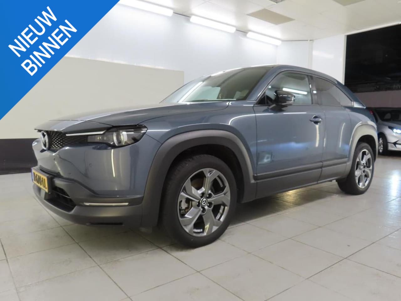 Mazda MX-30 - E-SKYACTIV 145 ADVANTAGE 36 KWH I SCHUIFDAK I 95% SOH I P-CAMERA I CLIMATE CONTROL I STOEL - AutoWereld.nl