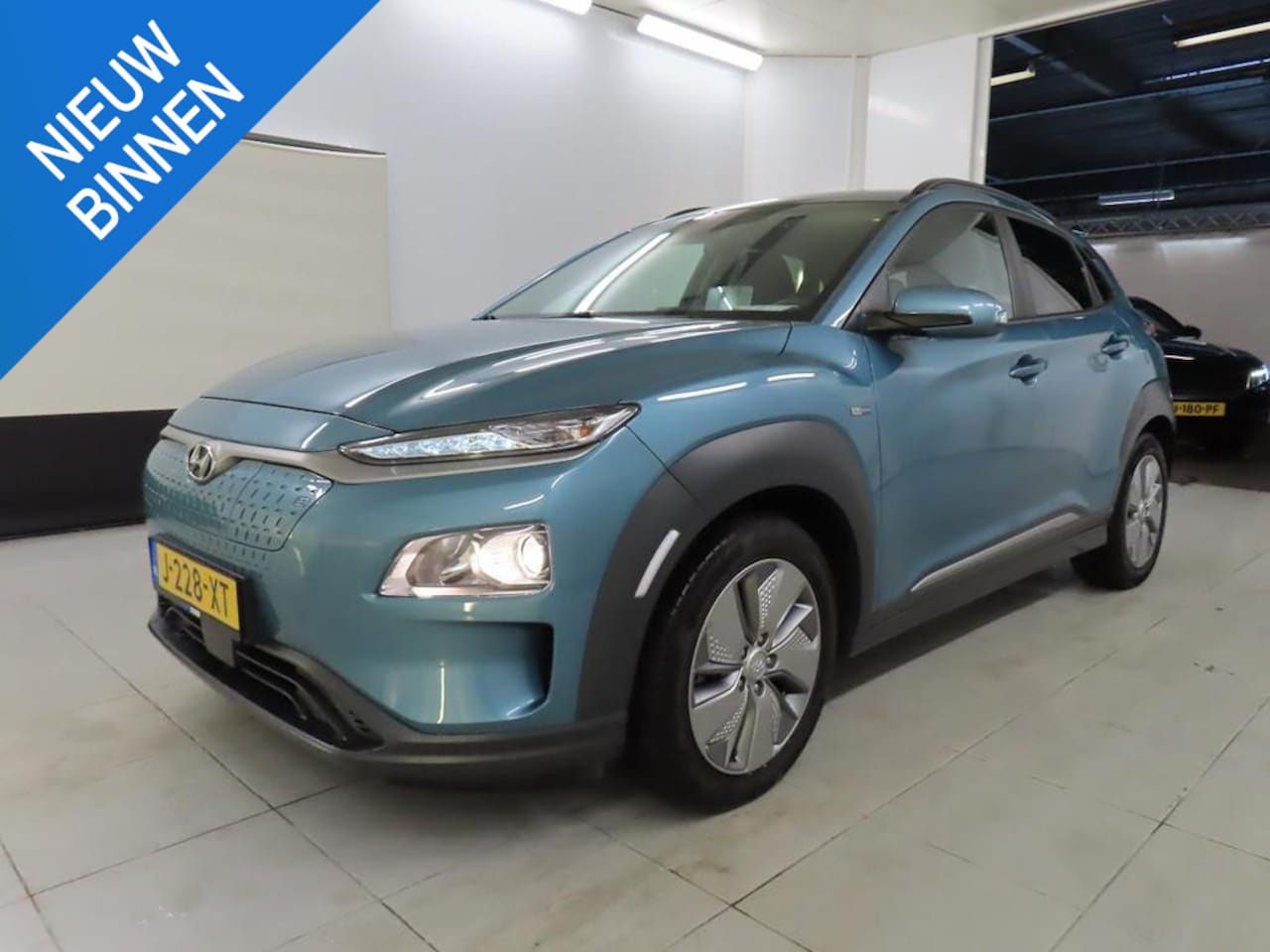 Hyundai Kona Electric - EV FASHION 64 KWH I 3 FASE I 100% SOH I P-CAMERA I AUTOMAAT I APPLE CARPLAY - AutoWereld.nl