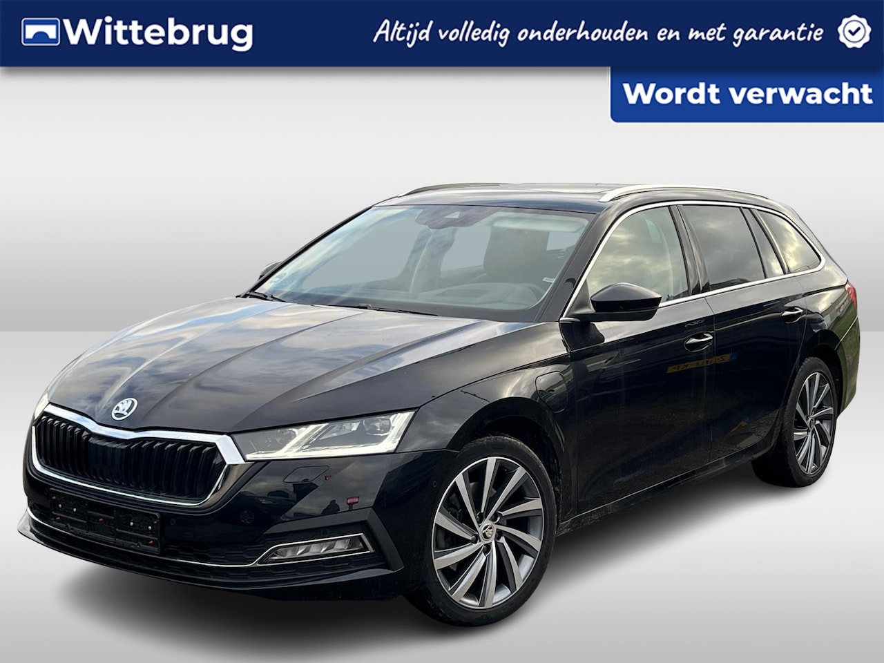 Skoda Octavia Combi - 1.4 TSI 204pk DSG iV PHEV Style / Panorama dak / Leer / Geheugen stoelen / Head-Up Display - AutoWereld.nl
