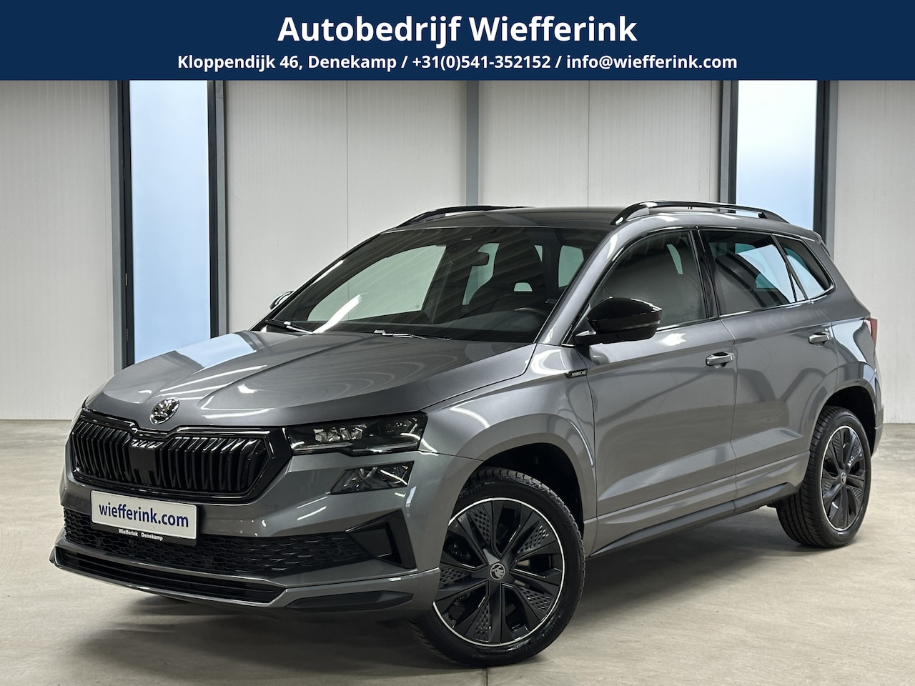 Skoda Karoq - 1.5 TSI 150pk ACT Sportline | Elek. Trekhaak | Navigatiepakket | ACC | Ambient Lighting - AutoWereld.nl