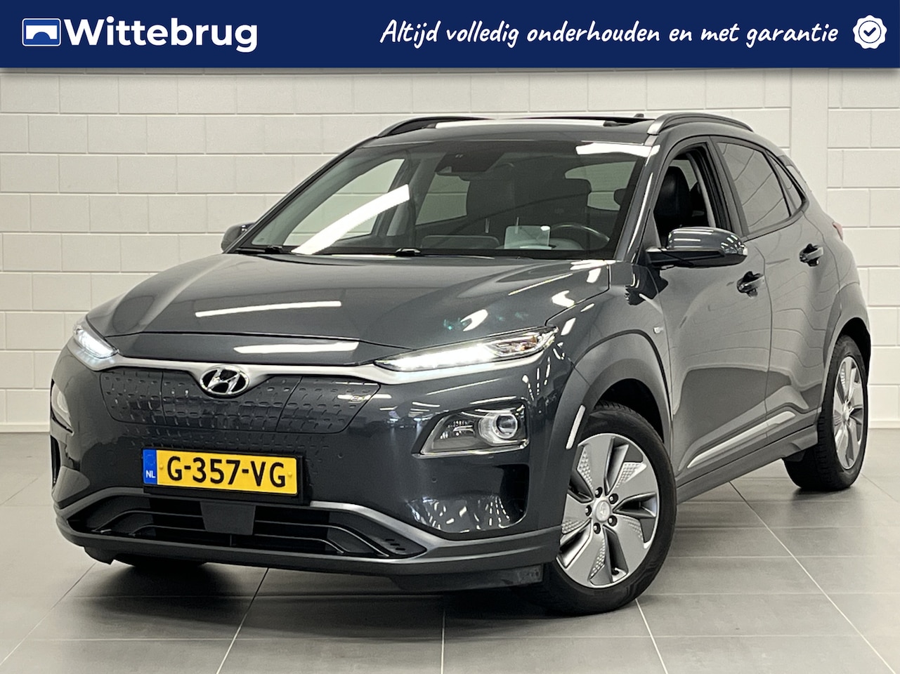 Hyundai Kona Electric - EV Premium Sky 64 kWh OPEN DAK | LEDER | FULL LED | LONG RANGE - AutoWereld.nl