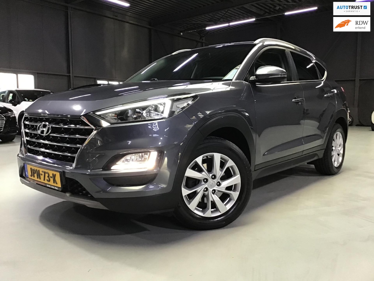 Hyundai Tucson - 1.6 T-GDI Premium I Stoel & Stuurverw.I Camera I Clima I Cruise I Navi I Trekhaak I 177PK - AutoWereld.nl