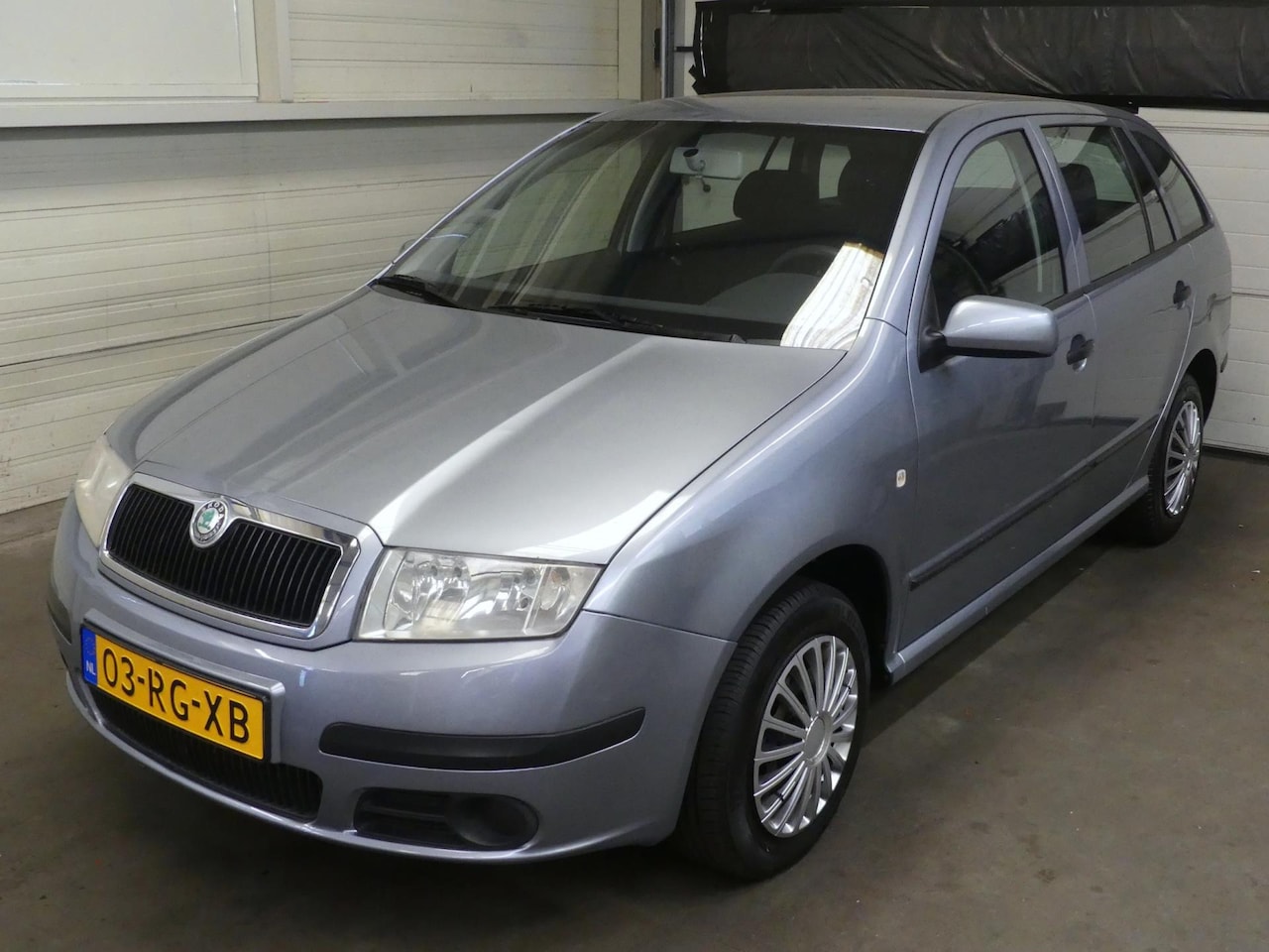 Skoda Fabia Combi - 1.4-16V Amb - Airco - Mooie auto! - Cruise Control - AutoWereld.nl