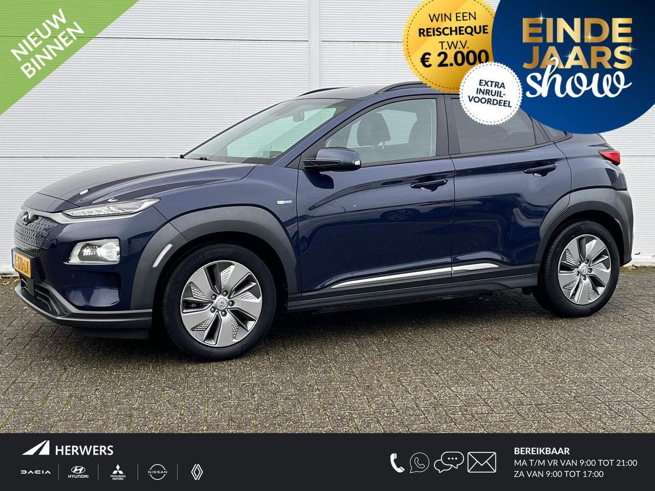 Hyundai Kona Electric - EV Limited 64 kWh / Trekhaak / Cruise control adaptief met Stop&Go en stuurhulp / Achterba - AutoWereld.nl