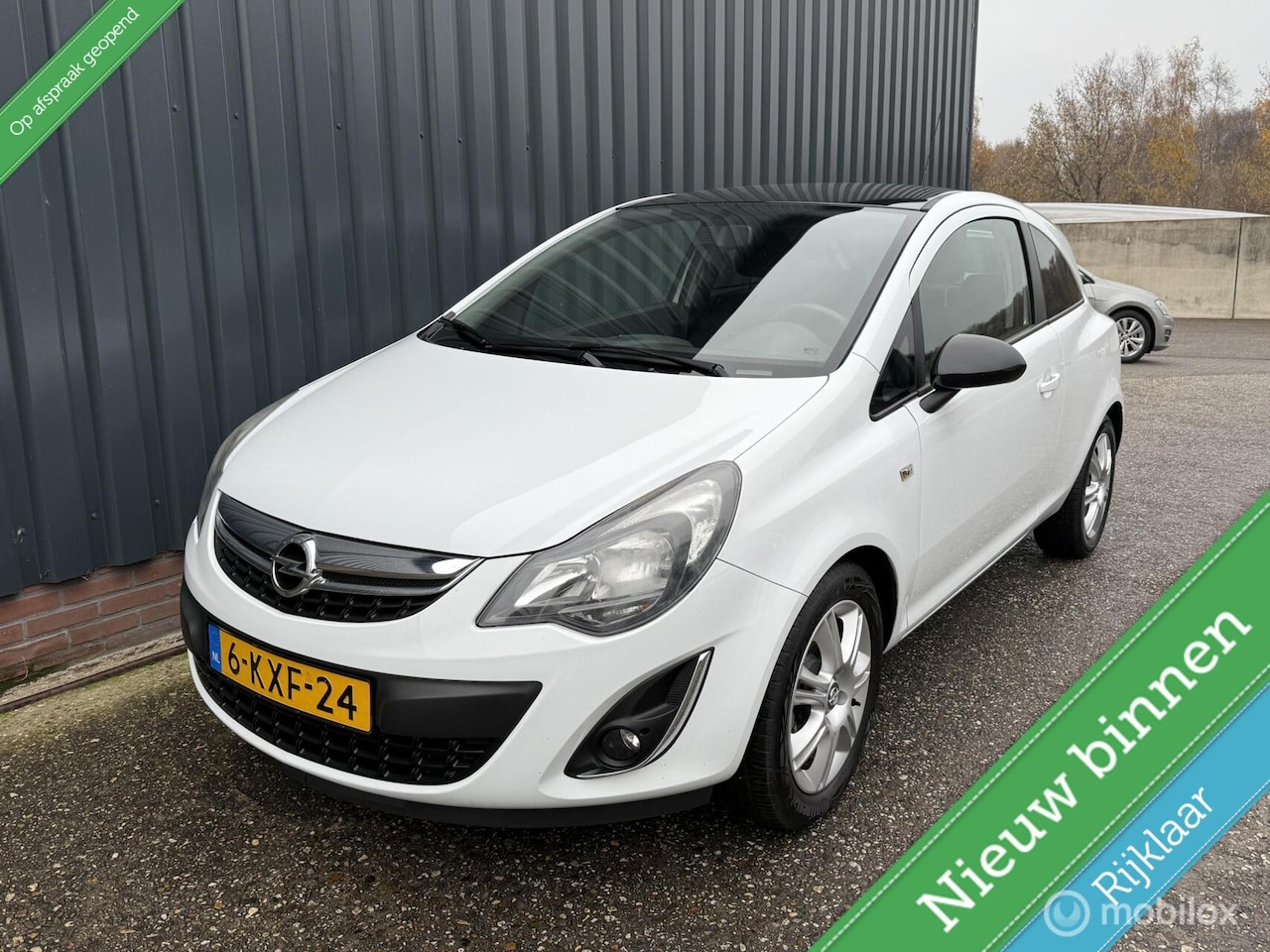 Opel Corsa - 1.2-16V Cosmo NAP/BOEKJE/CRUISE/AIRCO/NAVI/NETJES - AutoWereld.nl