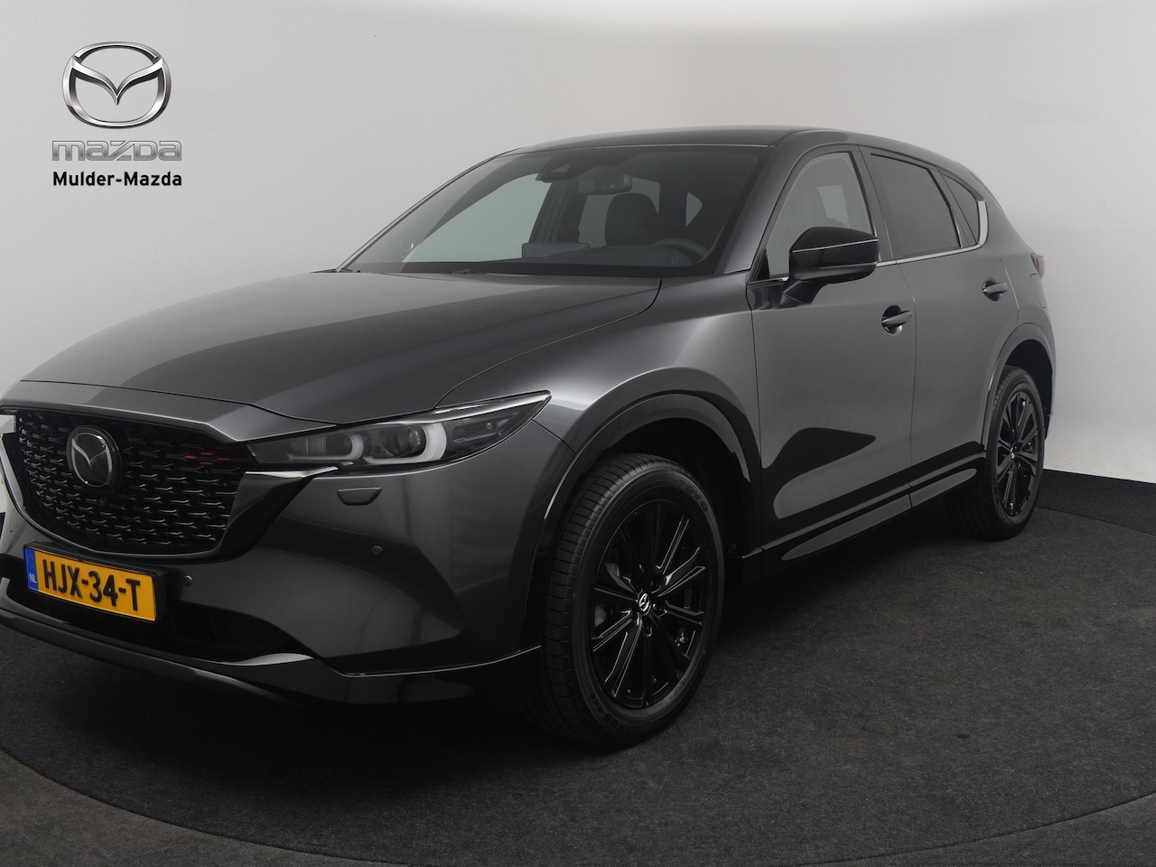 Mazda CX-5 - e-Skyactiv-G 165 Homura | 19-inch lichtmetalen velgen, Black | 360° View Monitor | 7-inch - AutoWereld.nl
