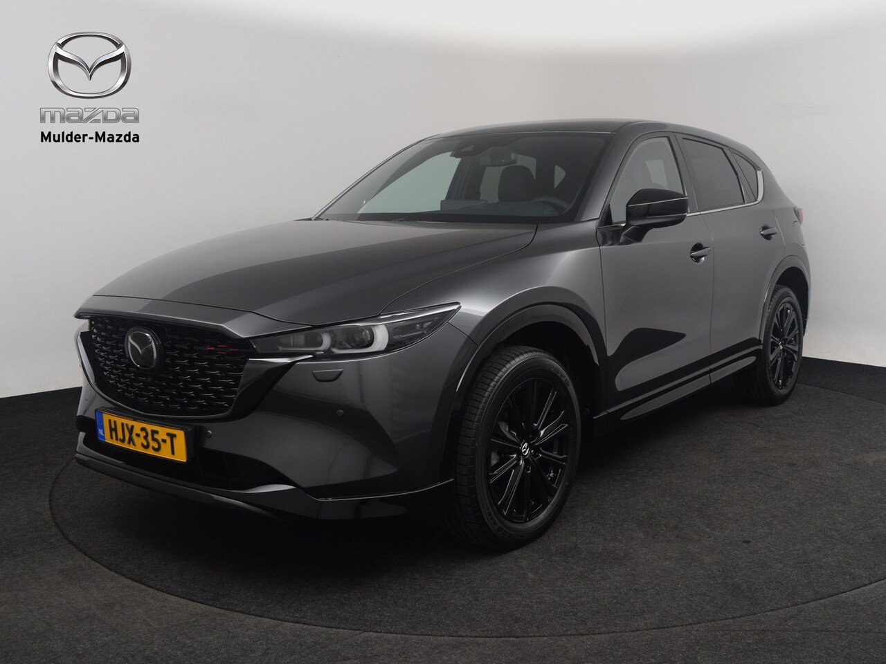 Mazda CX-5 - e-Skyactiv-G 165 Homura | 19-inch lichtmetalen velgen, Black | 360° View Monitor | 7-inch - AutoWereld.nl