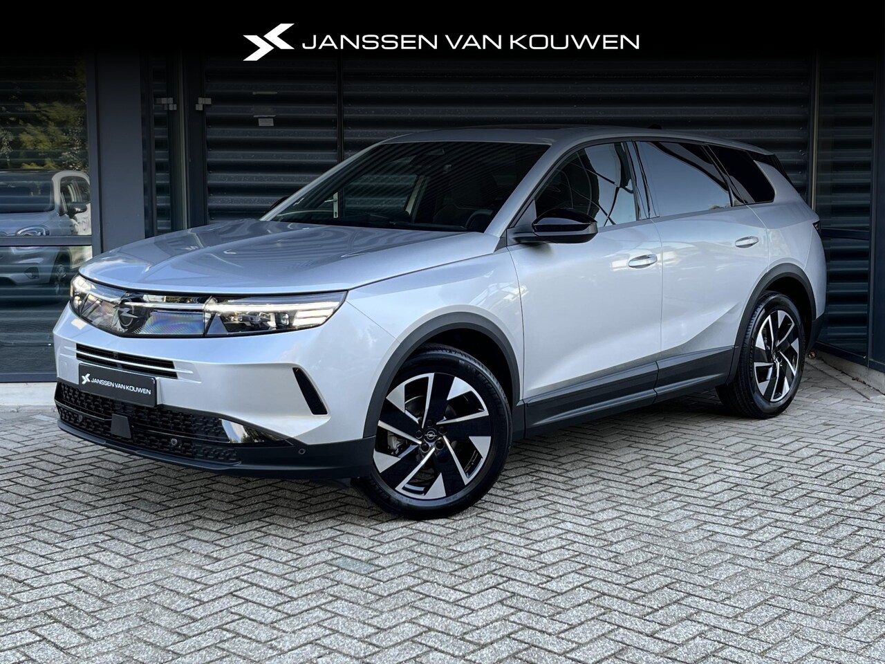 Opel Grandland - 1.2 Turbo Hybrid Business Edition * Lederen bekleding * BOMVOL - AutoWereld.nl