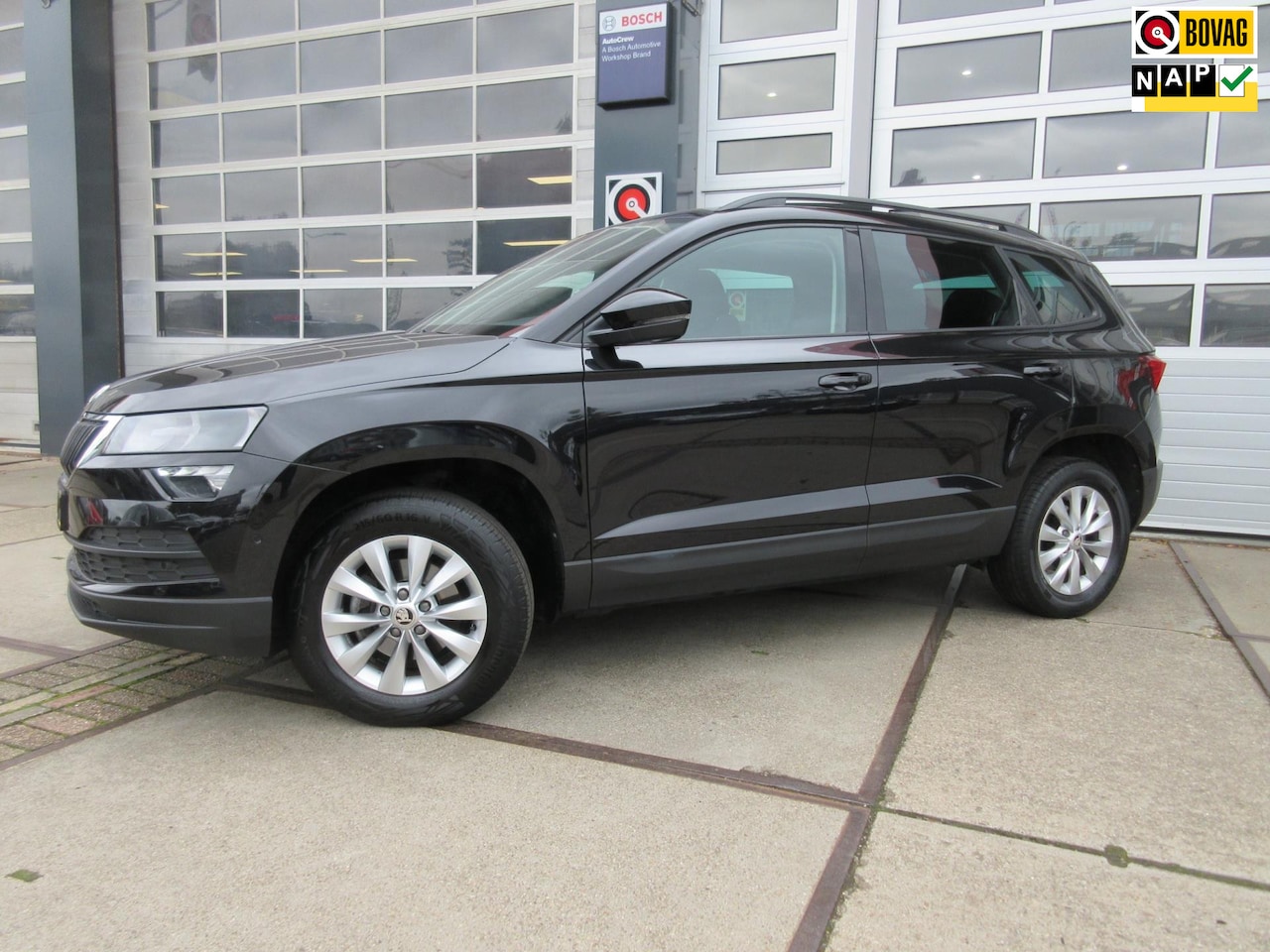 Skoda Karoq - 1.5 TSI ACT Business Edition / Schuifdak - AutoWereld.nl
