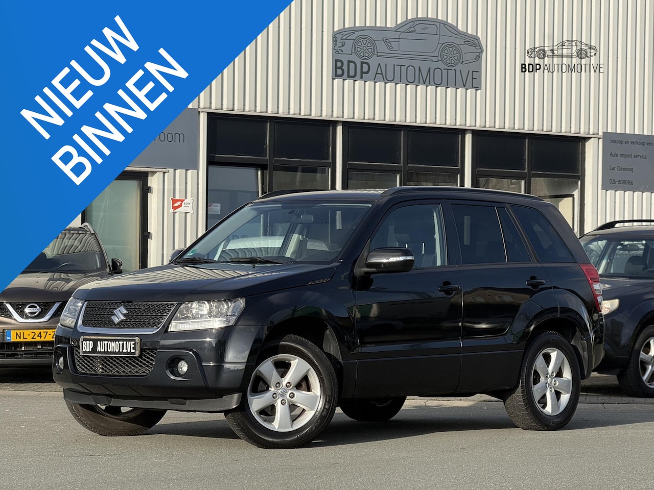 Suzuki Grand Vitara - 2.4 Exclusive AUTOMAAT/PARKEERSENSOREN/STOELVERWARMING/CRUISE/TREKHAAK - AutoWereld.nl