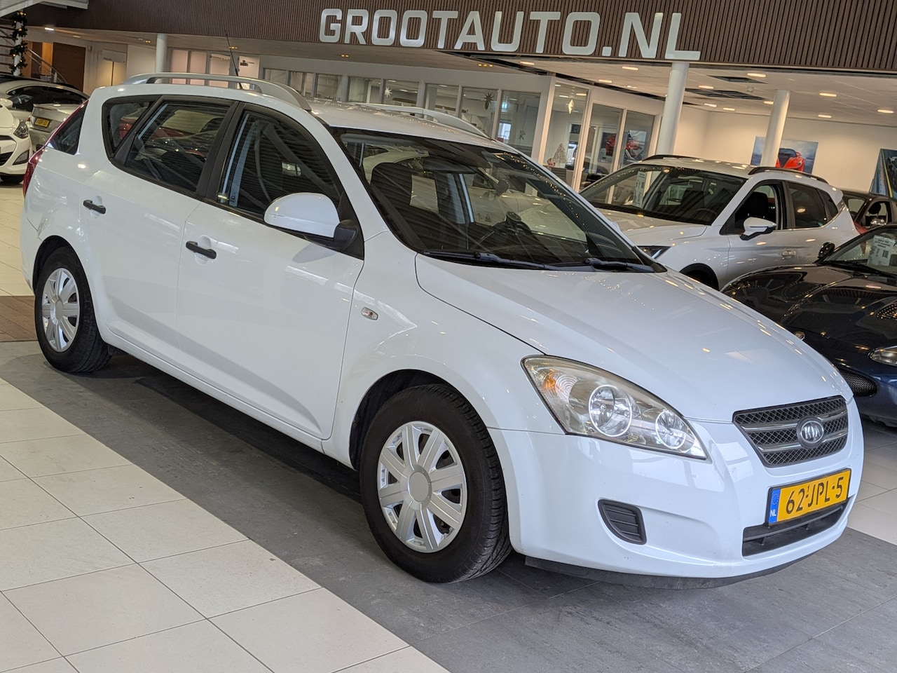 Kia Cee'd Sporty Wagon - 1.4 CVVT X-tra Airco, Stuurbekrachtiging - AutoWereld.nl
