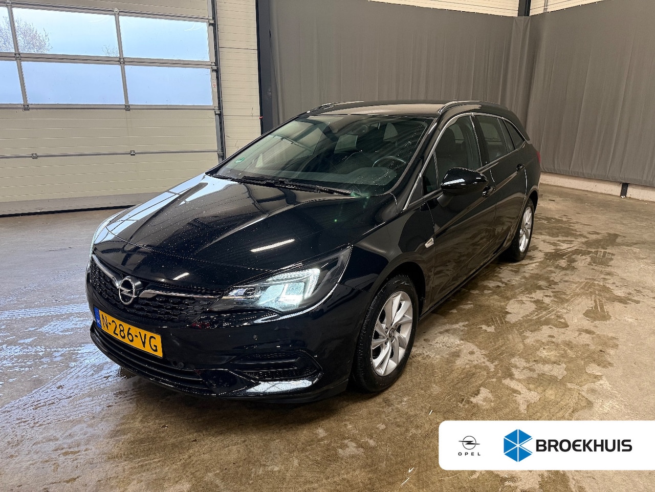 Opel Astra Sports Tourer - 1.2 Business Elegance 130PK | 100% onderhouden | Trekhaak | Achteruitrijcamera | Apple Car - AutoWereld.nl