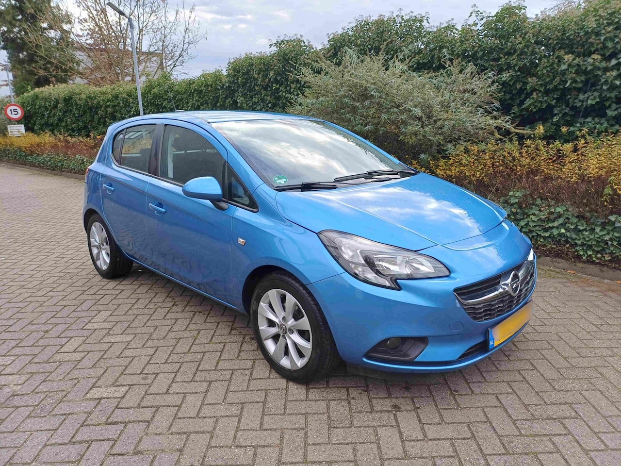 Opel Corsa - 1.4 Favourite navi - AutoWereld.nl