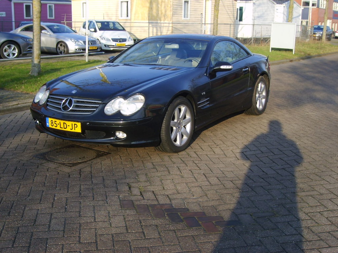 Mercedes-Benz SL-klasse Cabrio - 500 V-8 met A.B.C vering - AutoWereld.nl