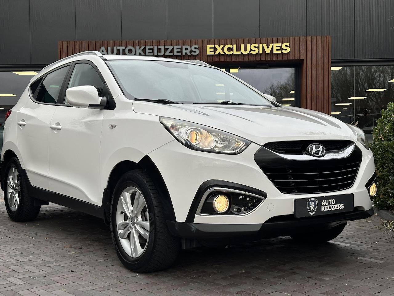 Hyundai ix35 - 2.0i Business Edition PDC Clima Stoelverwarming Camera Automaat! - AutoWereld.nl
