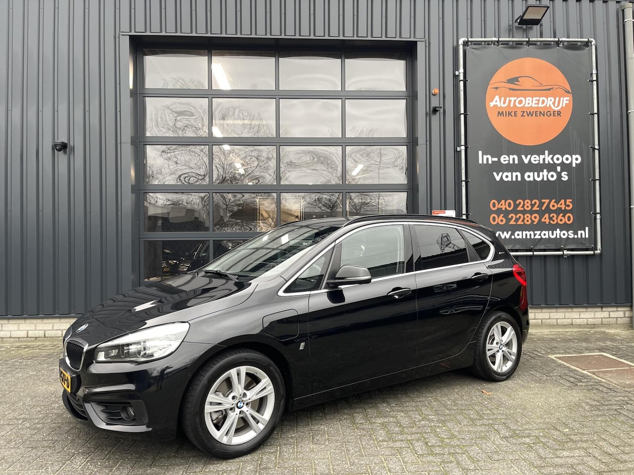 BMW 2-serie Active Tourer - 225xe iPerformance Centennial Executive HUD|KEYLESS|ACC|CAMERA|GROOT-NAVIGATIE|SFEERVERLIC - AutoWereld.nl