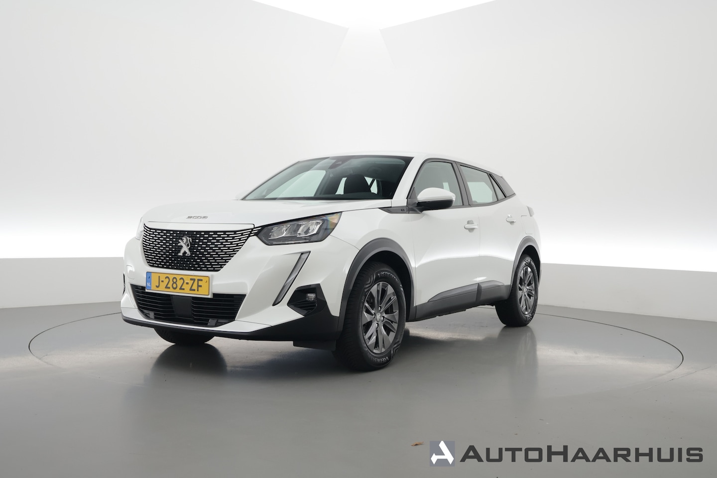 Peugeot e-2008 - EV Active 50 kWh | Navi | Apple CarPlay | Cruise | LED | Clima | All Seasons - AutoWereld.nl