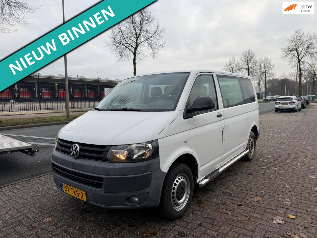 Volkswagen Transporter Kombi - 2.0 TDI L1H1 Trendline Baseline 9 PRSN BUS - AutoWereld.nl