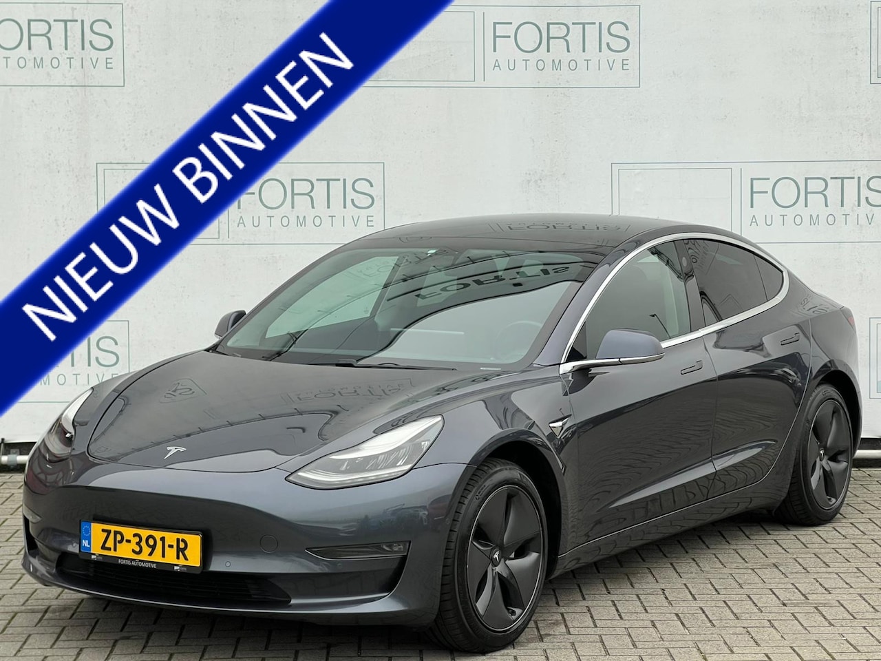 Tesla Model 3 - Long Range RWD Long Range AWD 75 kWh NL-AUTO | LONG RANGE - AutoWereld.nl