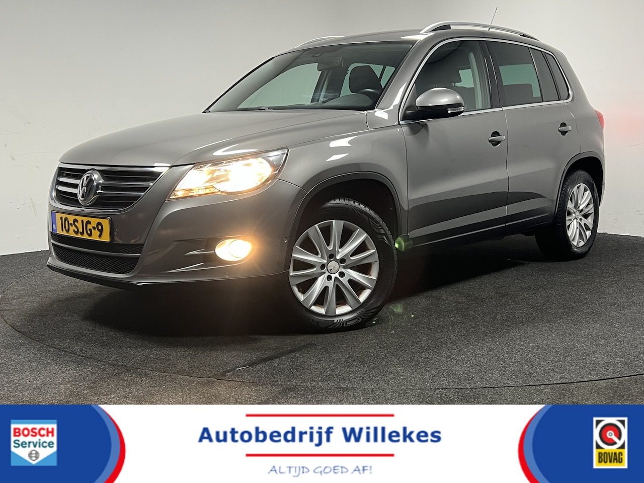 Volkswagen Tiguan - 1.4 TSI Sport&Style 4Motion | TREKHAAK | NAVI | CRUISE CONTROL | PARKEERSENSOREN | - AutoWereld.nl