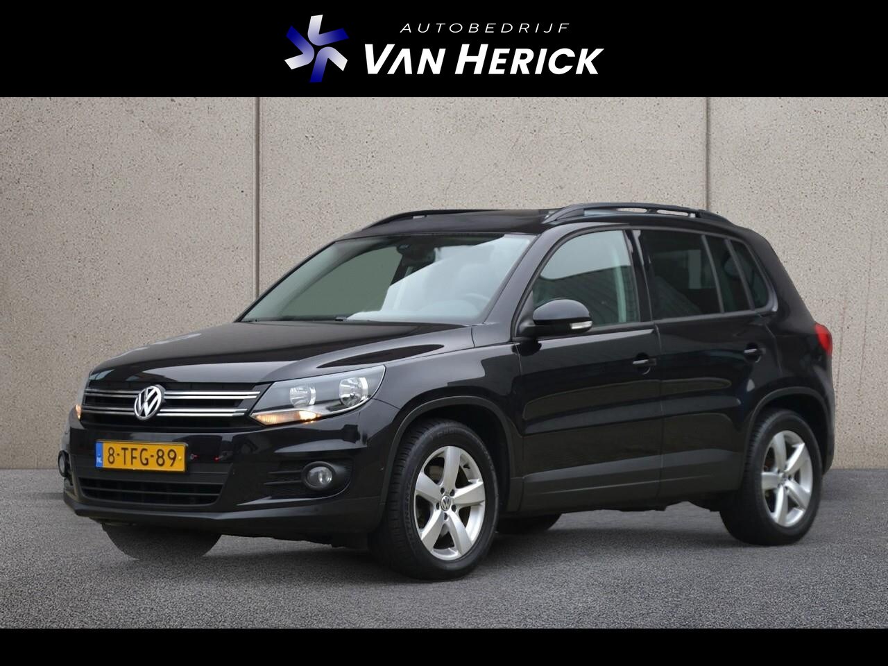 Volkswagen Tiguan - 1.4 TSI Design Edition | Clima | Panoramadak | Compleet - AutoWereld.nl
