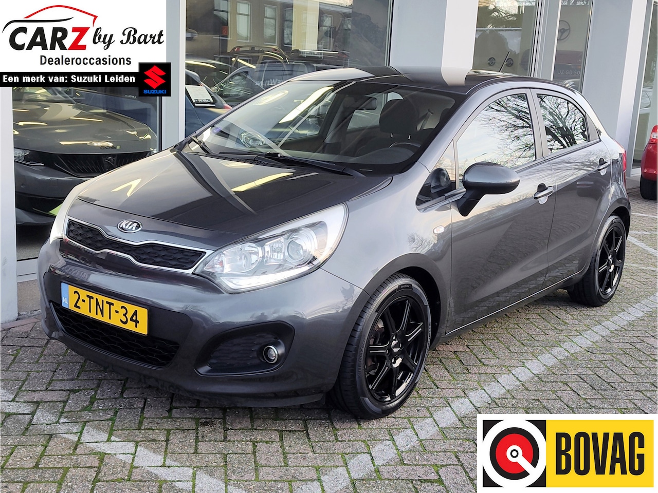Kia Rio - 1.2 CVVT BUSINESSLINE Airco | Cruise | Automatische verlichting - AutoWereld.nl