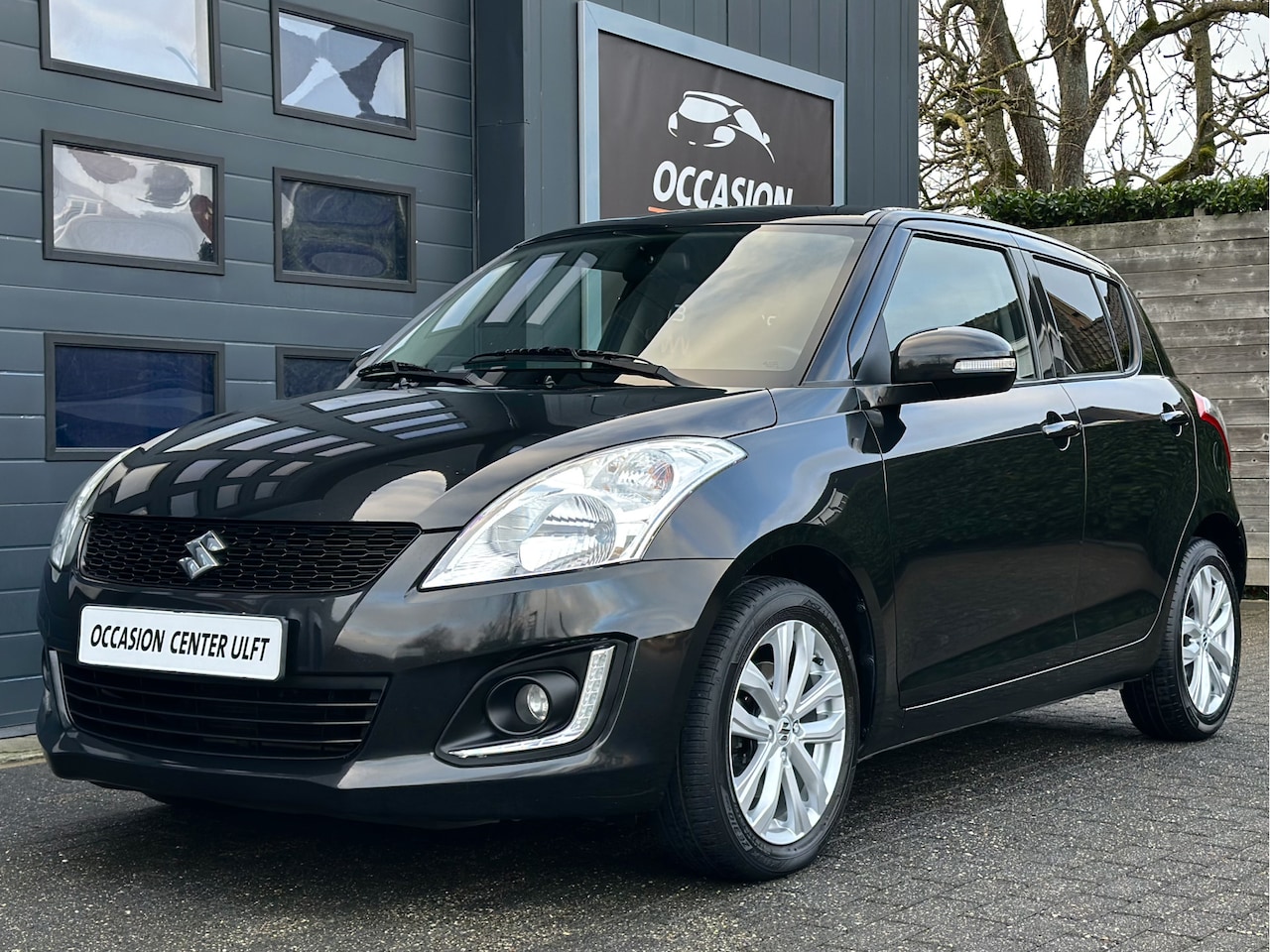 Suzuki Swift - CLIMATE CRUISE CONTR / KEYLESS GO / PDC .... - AutoWereld.nl