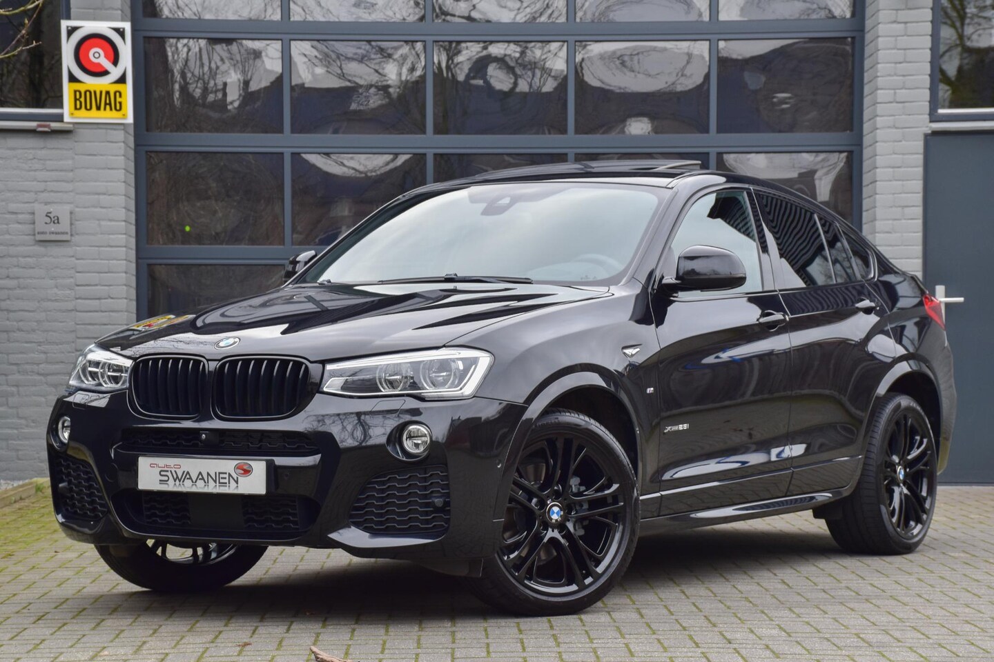 BMW X4 - xDrive28i High Executive M Sport | Glasdak | ACC | E-Trekhaak - AutoWereld.nl