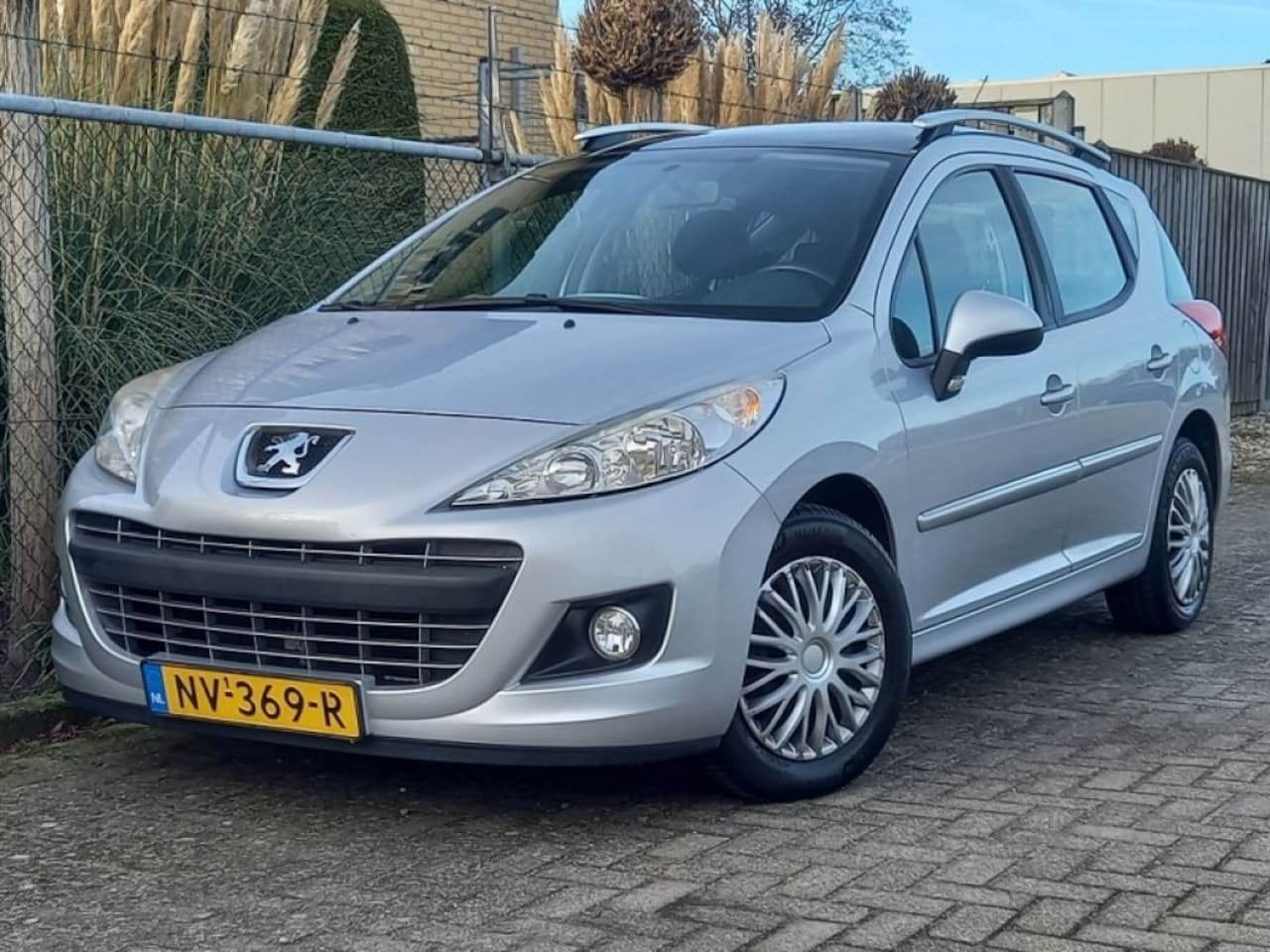 Peugeot 207 - sw 1.4 vti allure/ Panodak/ Airco/ Zeer netjes - AutoWereld.nl
