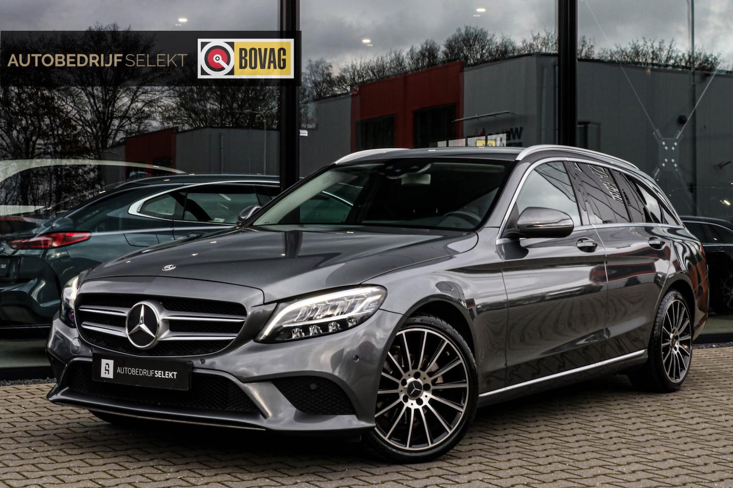 Mercedes-Benz C-klasse Estate - 180 - CARPLAY - NAVI - CAMERA - DEALER ONDERHOUDEN - STOELVERWARMING - SFEERVERLICHTING - - AutoWereld.nl
