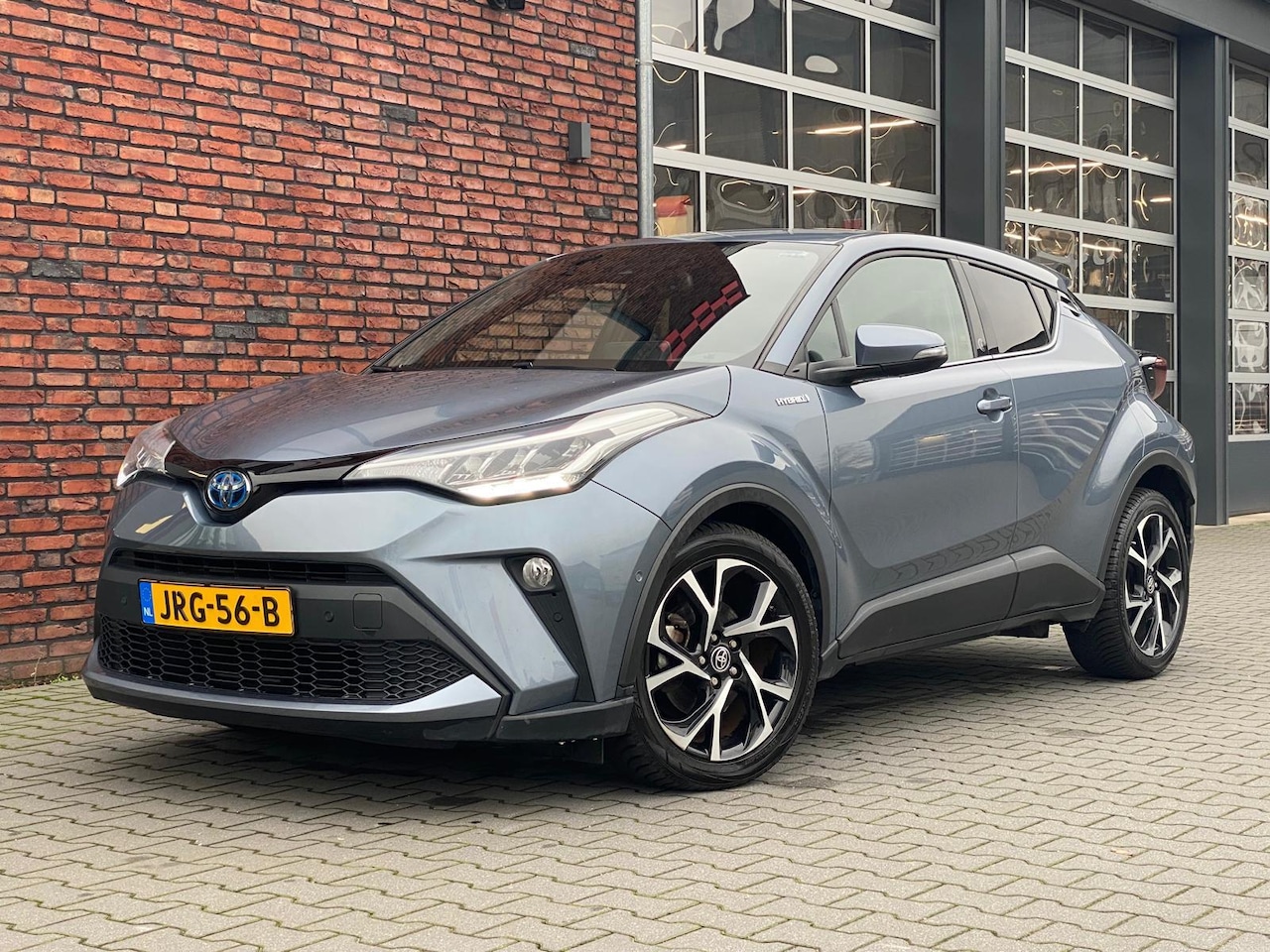 Toyota C-HR - 1.8 Hybrid Dynamic stoelverwarming/all seasonbanden - AutoWereld.nl