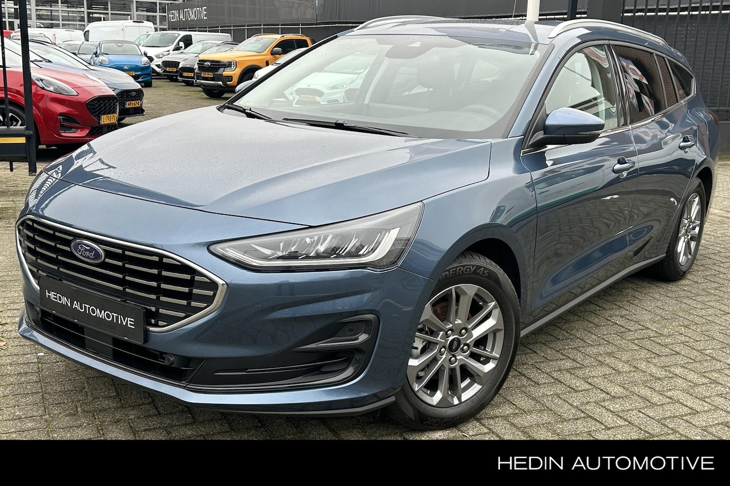 Ford Focus Wagon - 1.0 EcoBoost Hybrid Titanium | Automaat | All season banden - AutoWereld.nl