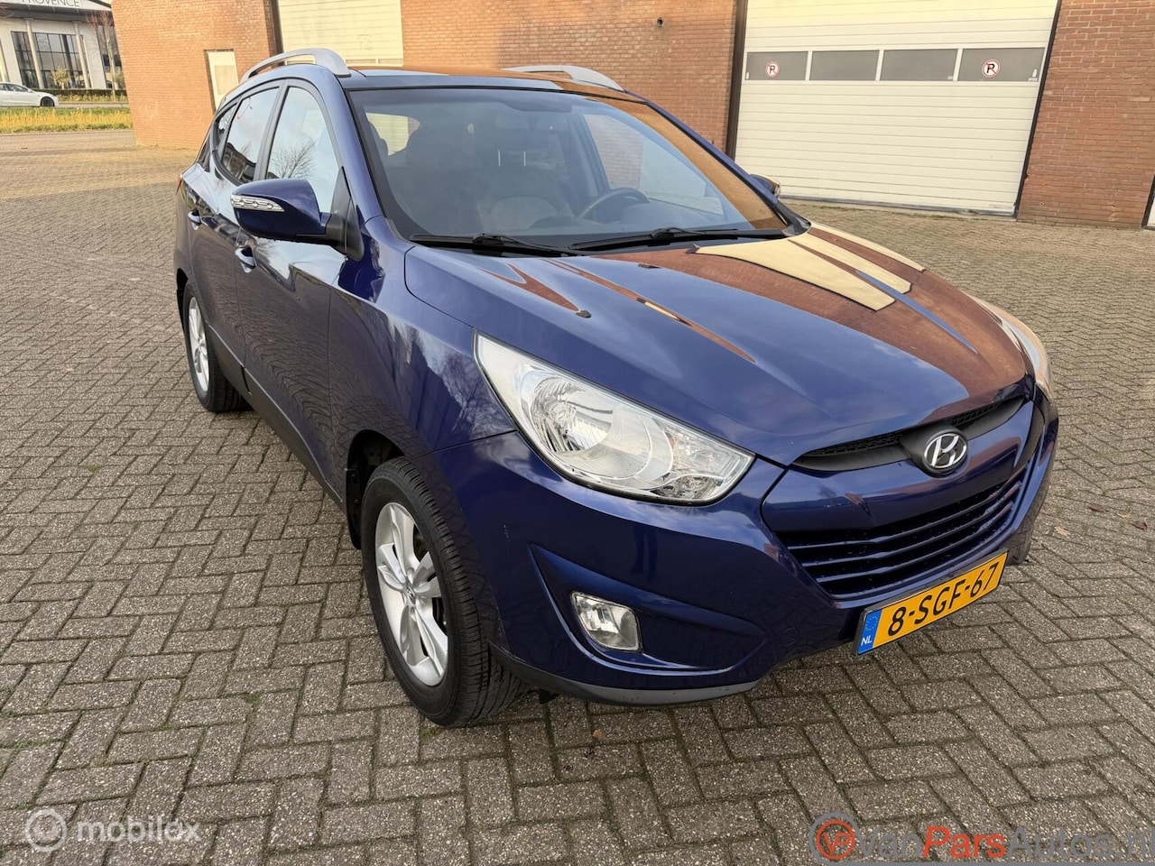 Hyundai ix35 - 2.0i 4WD Style 2.0i 4WD Style,Automaat,Leer,Pano - AutoWereld.nl