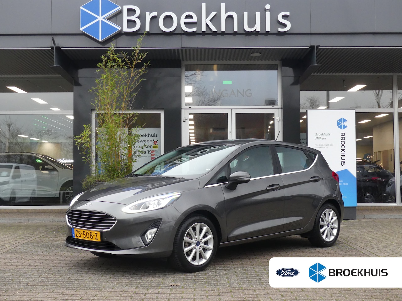 Ford Fiesta - 1.0 EcoBoost 100PK Titanium | CAMERA | VOORRUITVERWARMING | NAVI | PARKEERSENSOREN V+A | D - AutoWereld.nl