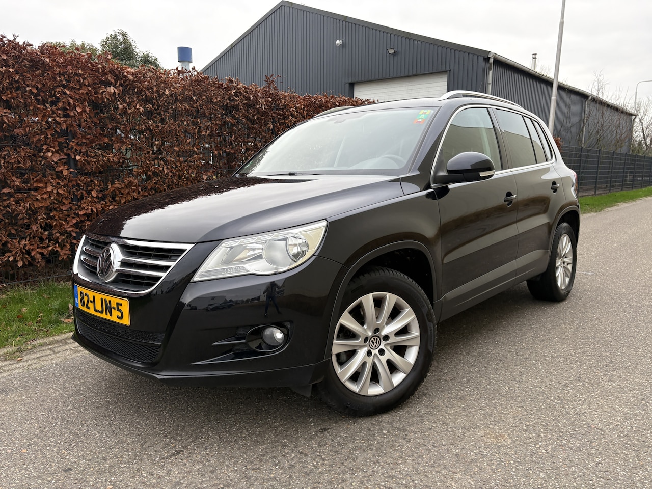 Volkswagen Tiguan - 1.4 TSI Sport&Style / CRUISE / AIRCO / STOELVERWARMING - AutoWereld.nl