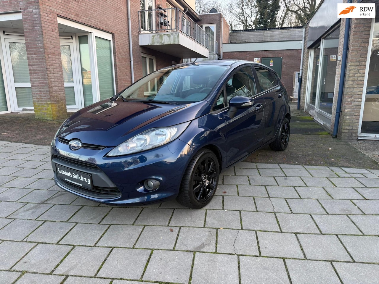Ford Fiesta - 1.25 Titanium airco lm velgen el ramen 5drs 91745 km - AutoWereld.nl