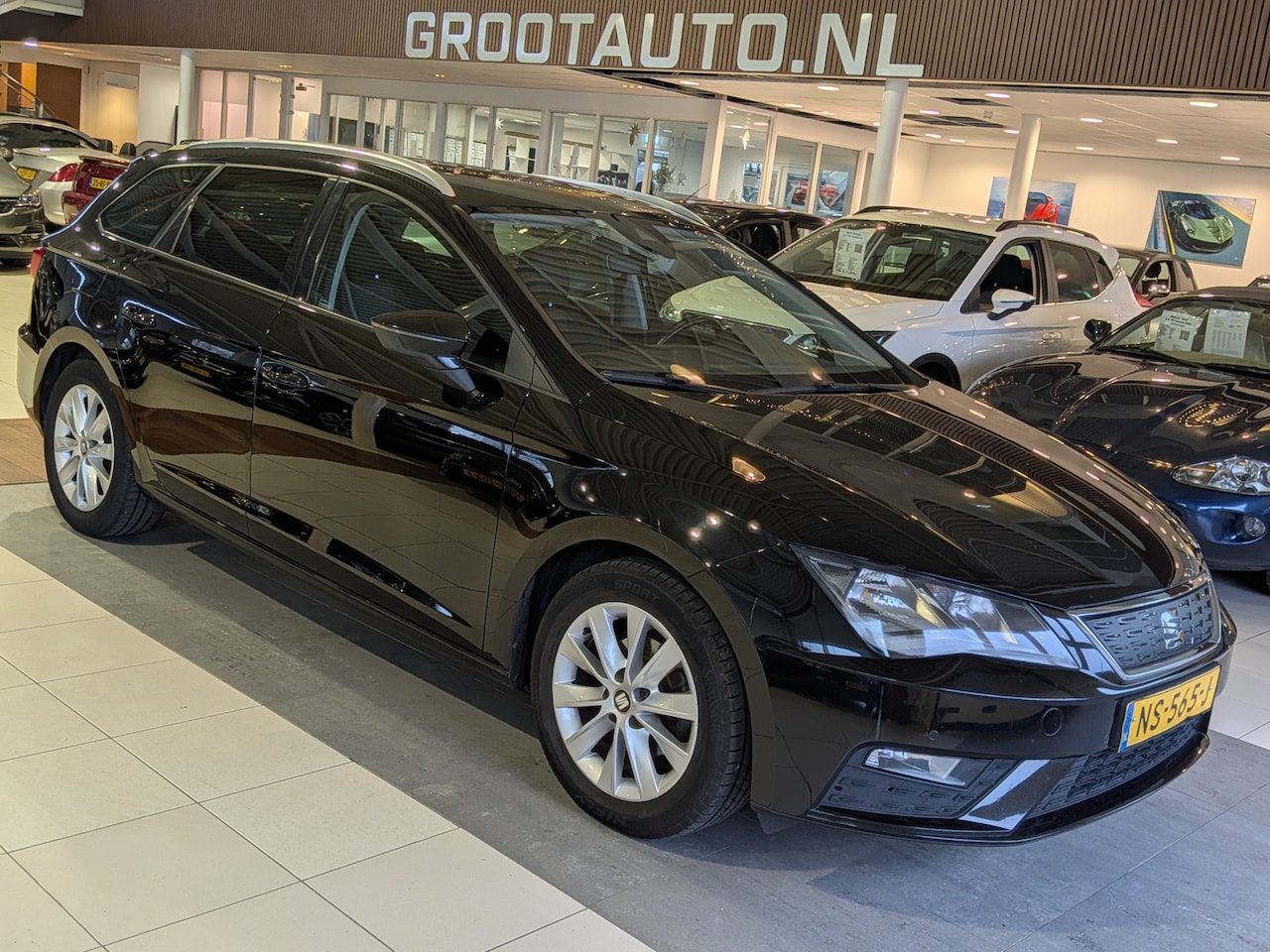 SEAT Leon ST - 1.0 EcoTSI Style Business Intense Airco, Apple/Android, Cruise Control, Stuurbekrachtiging - AutoWereld.nl