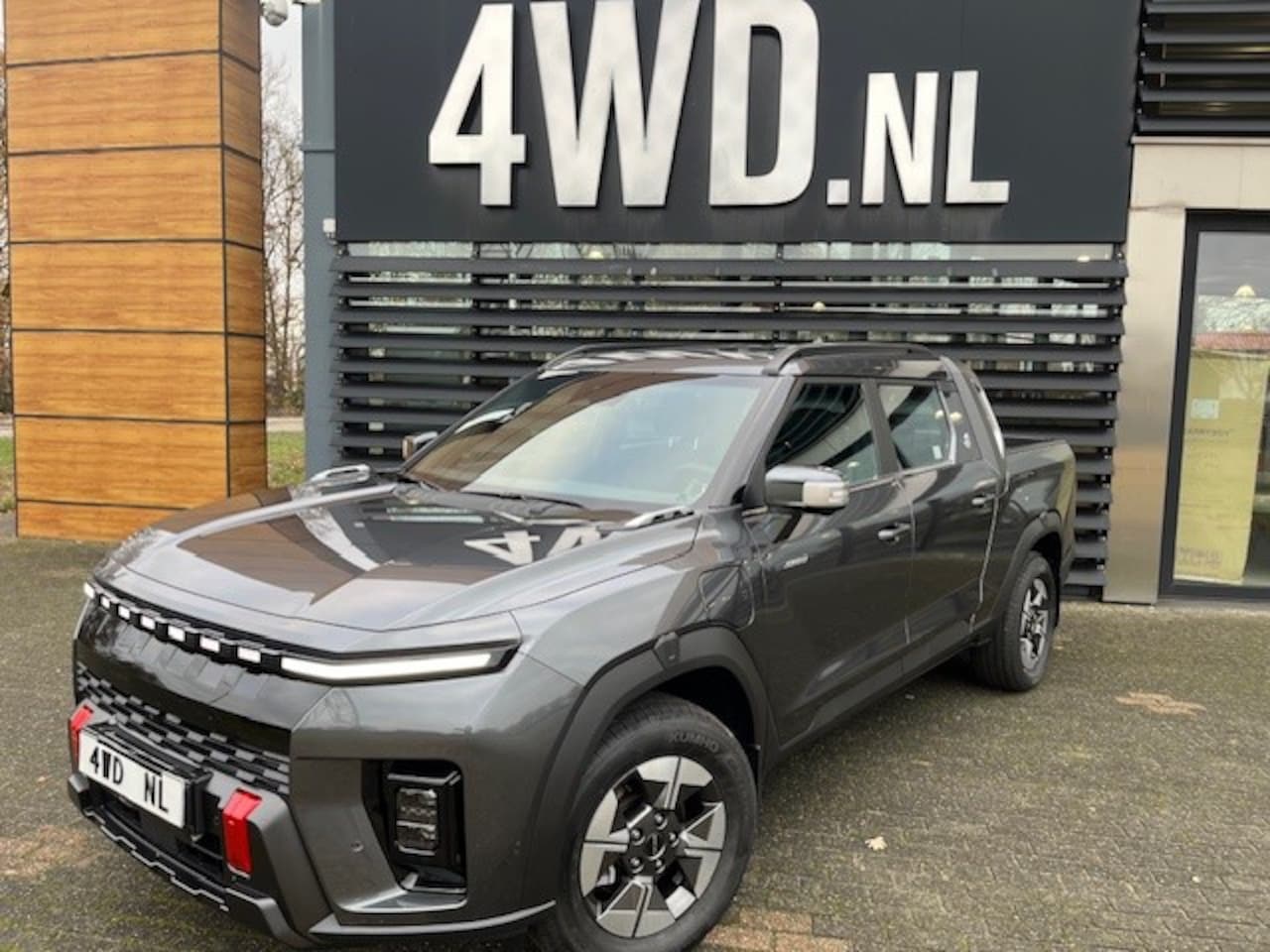 KGM Musso EV - 82 KW PICK UP 5 pers 1800 KG trekhaak VOORRAAD AUTO WLTP 466 KM € 45495 EXCL BTW Unieke GR - AutoWereld.nl