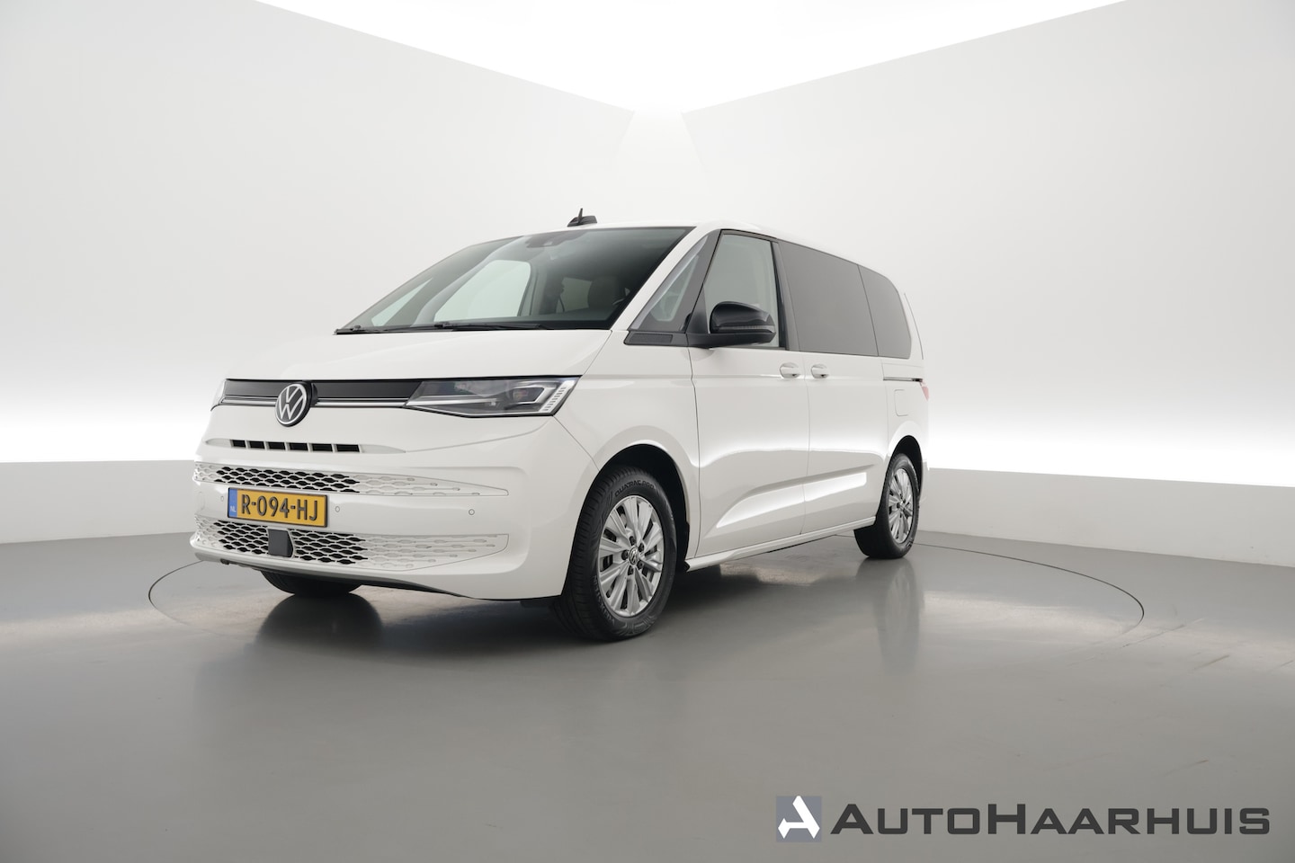 Volkswagen Multivan - 1.4 eHybrid L2H1 218pk | 7 Pers. | IQ. Light | Camera | Adapt. Cruise | Apple CarPlay | Al - AutoWereld.nl
