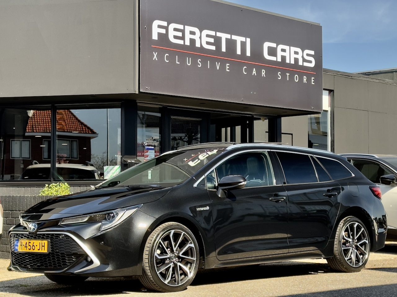 Toyota Corolla Touring Sports - 2.0 HYBRID PREMIUM AUTOM PANODAK LEDER NAVI CAMERA LED LMV PDC - AutoWereld.nl