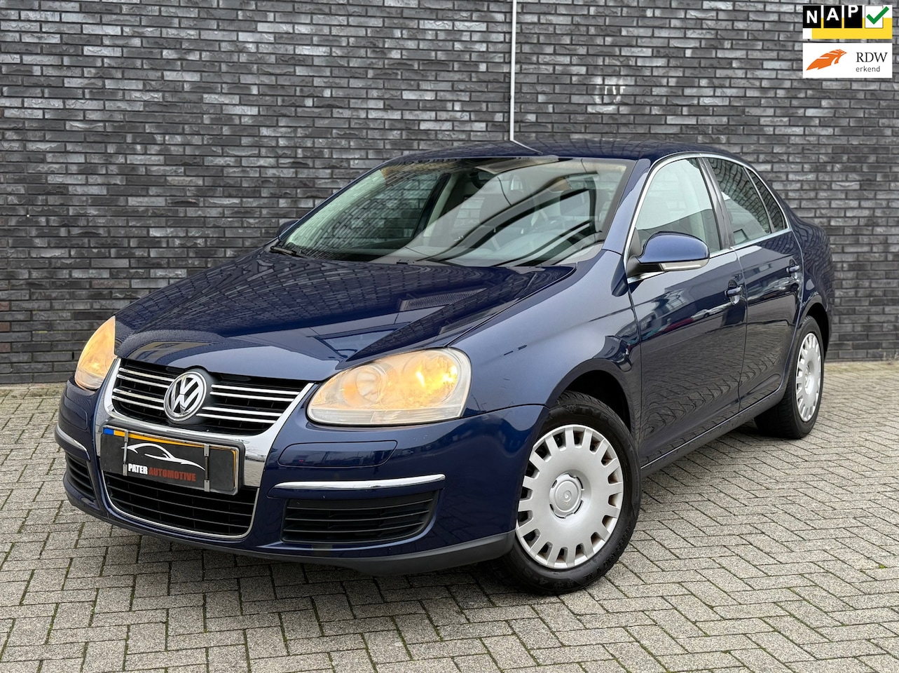 Volkswagen Jetta - 1.6 Comfortline Navigatie Grootscherm|Climate & Cruise Control|Trekhaak|NWE APK - AutoWereld.nl