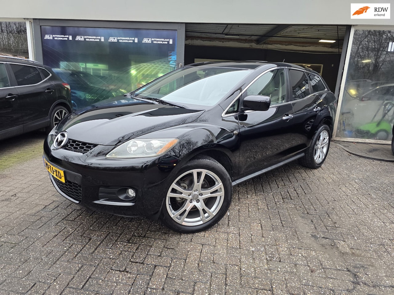 Mazda CX-7 - 2.3 Turbo Touring | AUTOMAAT | 12MND GARANTIE | LEDER | SCHUIFDAK | CRUISE | NW APK | - AutoWereld.nl