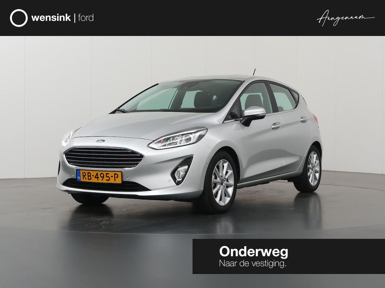 Ford Fiesta - 1.0 EcoBoost Titanium | Navigatie | Parkeercamera | B&O | Climate Control | Cruise Control - AutoWereld.nl