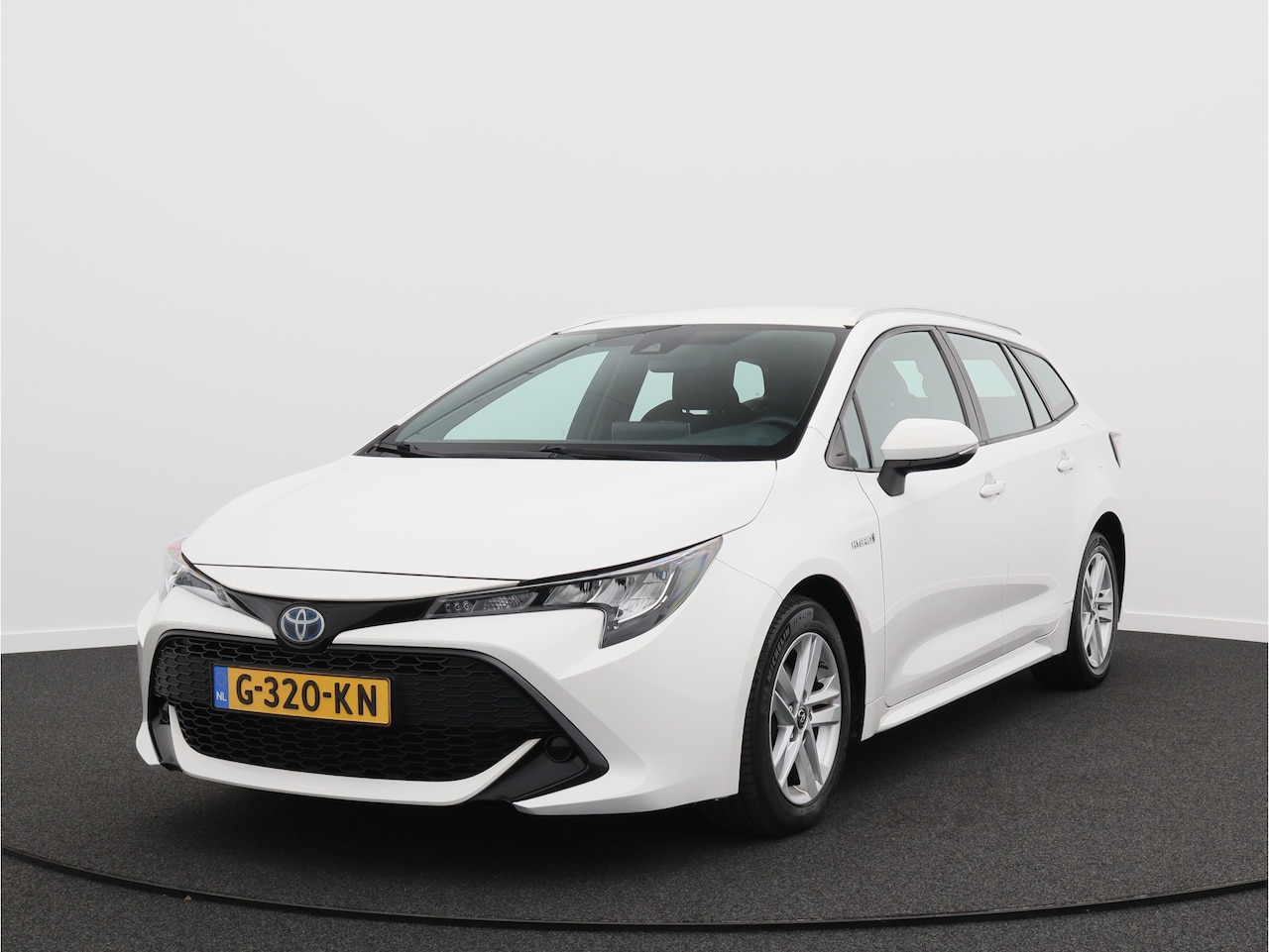 Toyota Corolla Touring Sports - 1.8 Hybrid Active/ lage km/ trekhaak - AutoWereld.nl